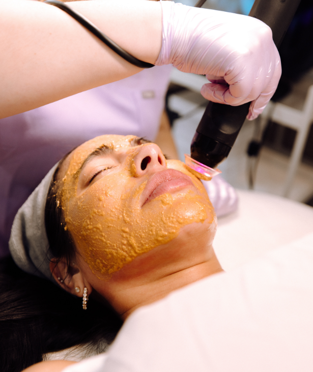 Client receiving a regenerative skin longevity treatment like Glo2facial available to LUX VIP members.